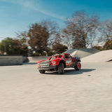 ARRMA MOJAVE GROM MEGA 380 Brushed 4X4 Small Scale Desert Truck RTR with Battery & Charger, Red/Black